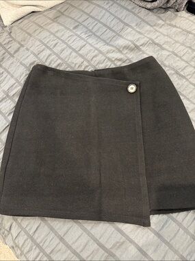 Commense Black Asymmetrical Wrap Mini Skirt with Button